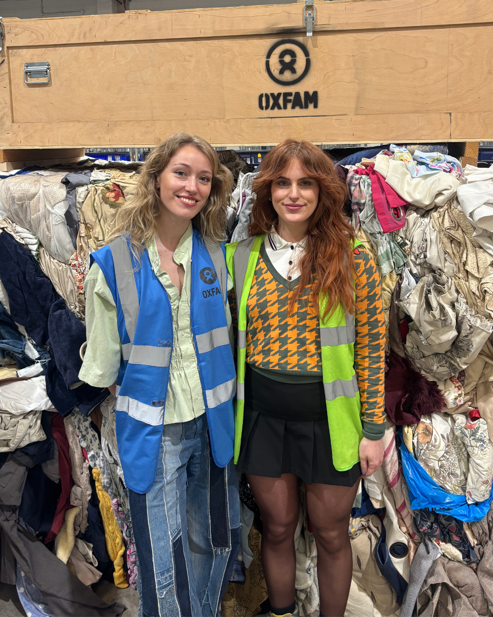 The founder of Loom, Daisy Harvey stood in Batley Warehouse with Ffion Oxfam's festival and events manager.
