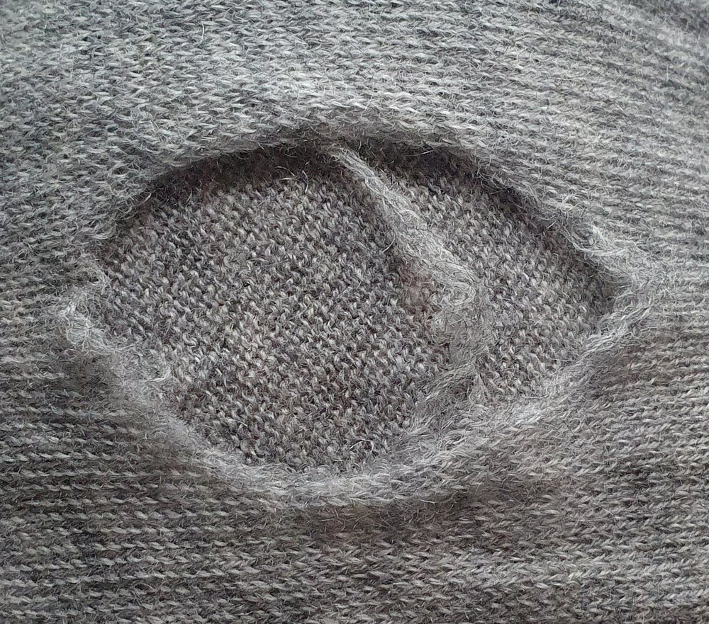 How to embroider over holes to repair your clothes