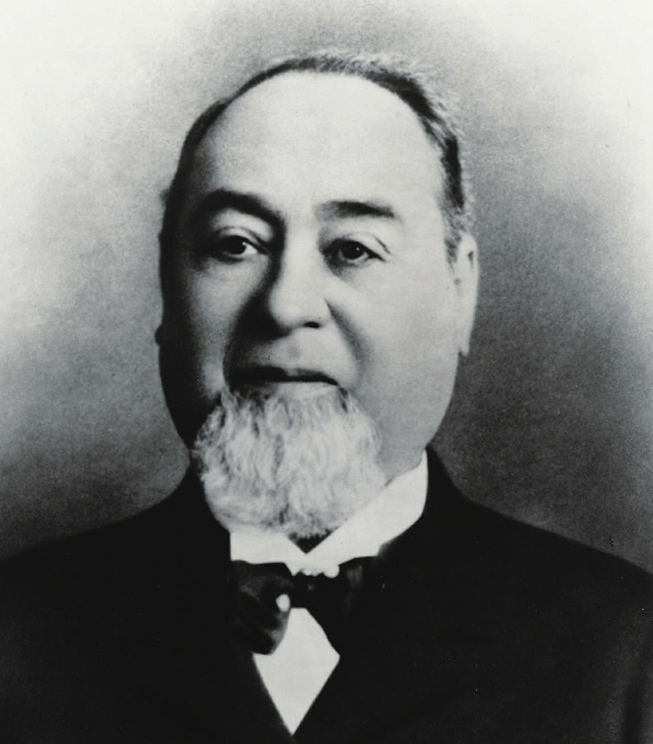 A black and white photo of Levi Strauss
