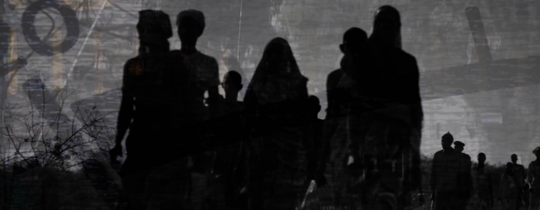 A grey image with the silhouettes of people who appear to be walking. In the background is dark imagery of what appears to be rope, a bush with no leaves, and fences giving the impression of conflict and the displacement of people.