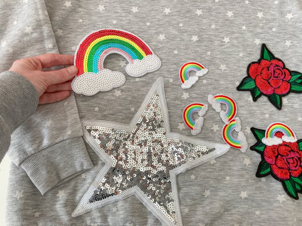 A jumper with some bright-coloured patches sewn on.  Photo: Cassie Fairy