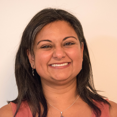 A picture of Aleema Shivji smiling