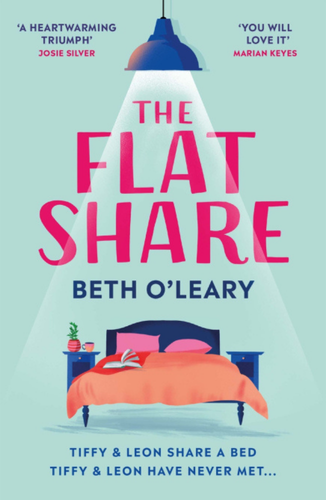 Book cover of The Flatshare by Beth O'Leary. Pale blue background with hanging lamp shining a spotlight on the title in large pink letters. Below is an illustration of a double bed and the text 'Tiffy & Leon share a bed, Tiffy & Leon have never met...'