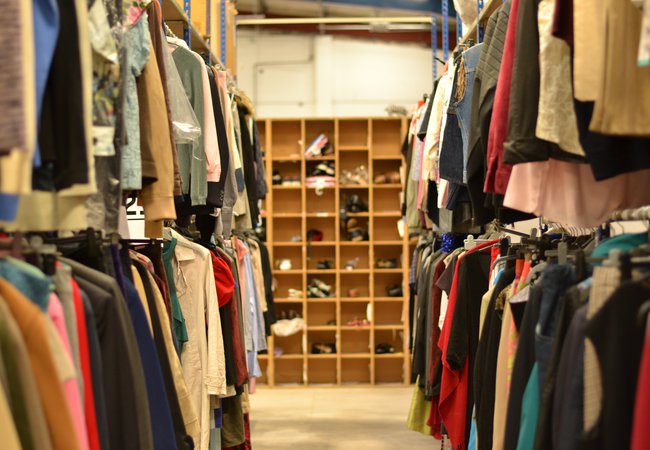 Racks of donated clothes at our Batley distribution hub