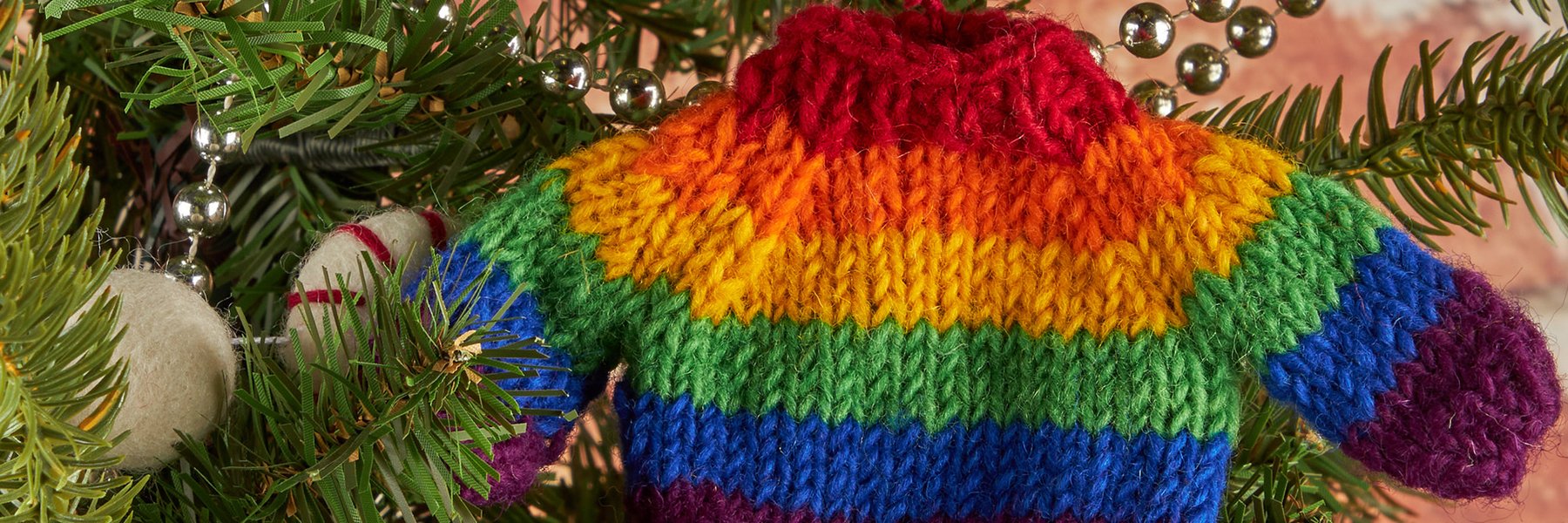 An Oxfam knitted Christmas tree decoration