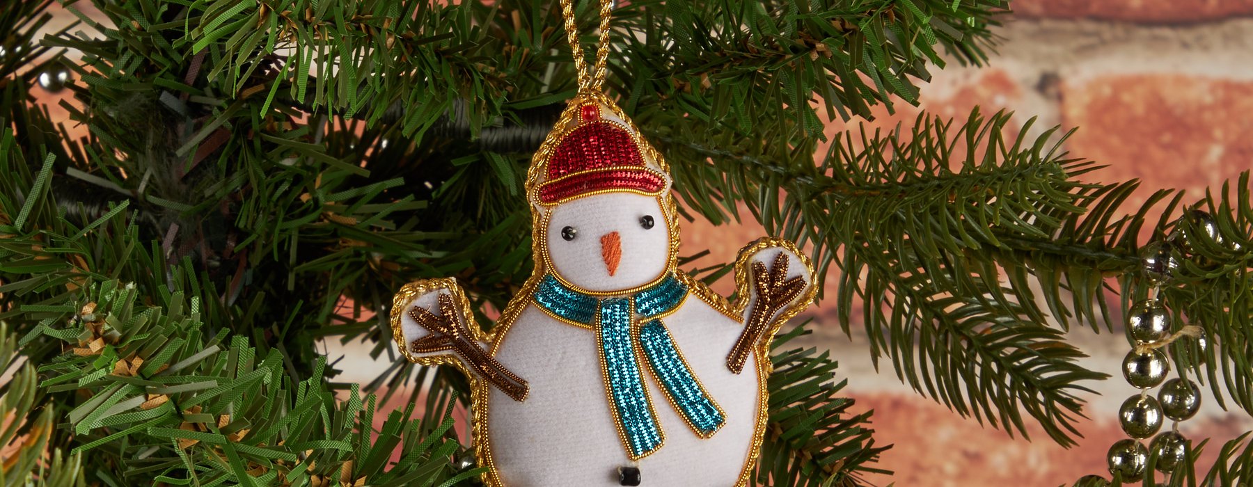 Gold work snowman tree decoration