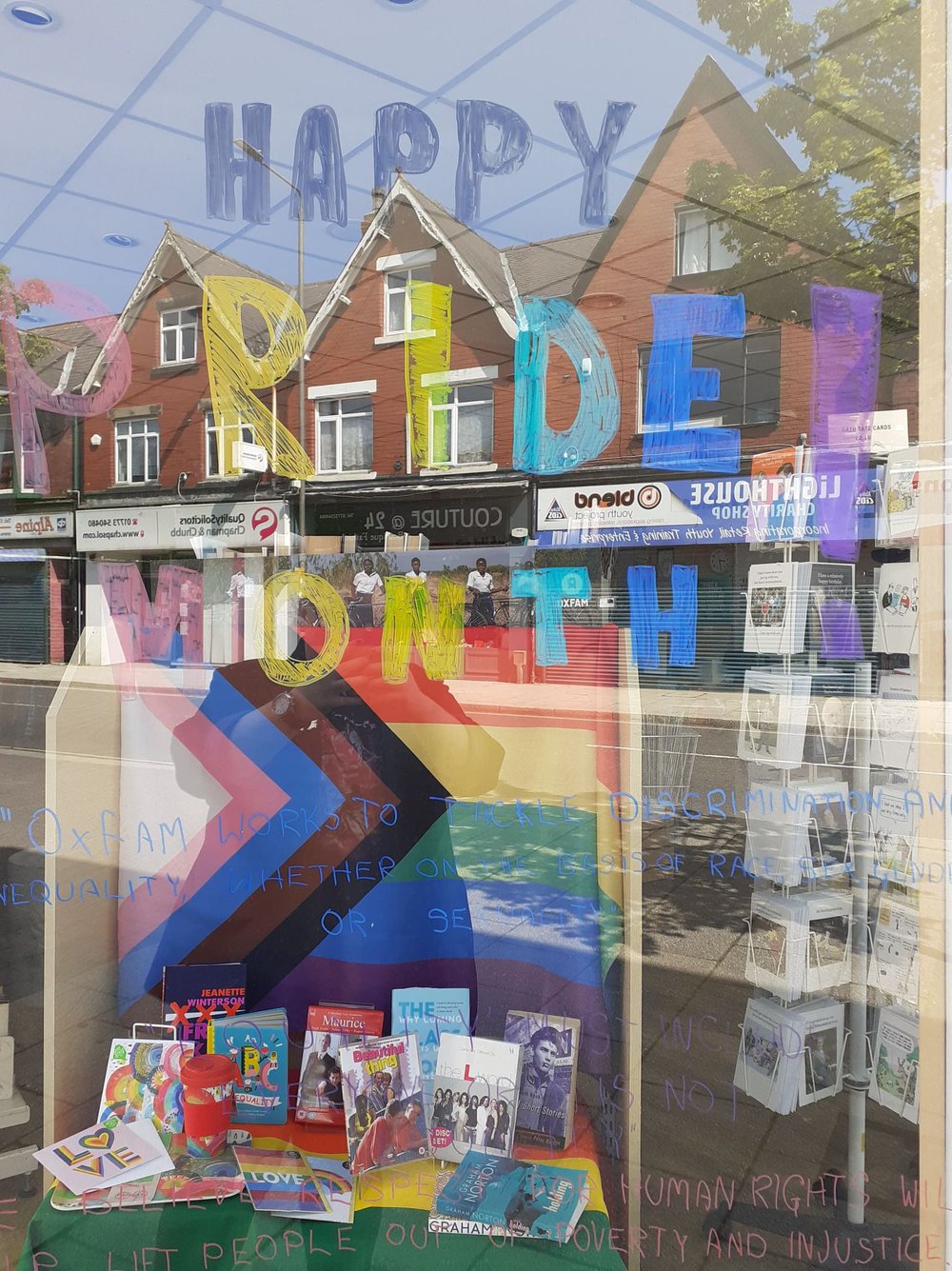 An Oxfam Pride month shop window