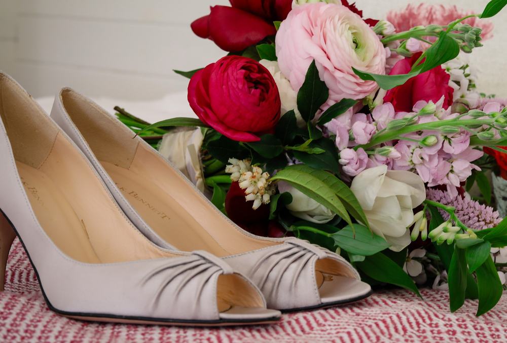 L.K.Bennett silver shoes with floral wedding bouquet