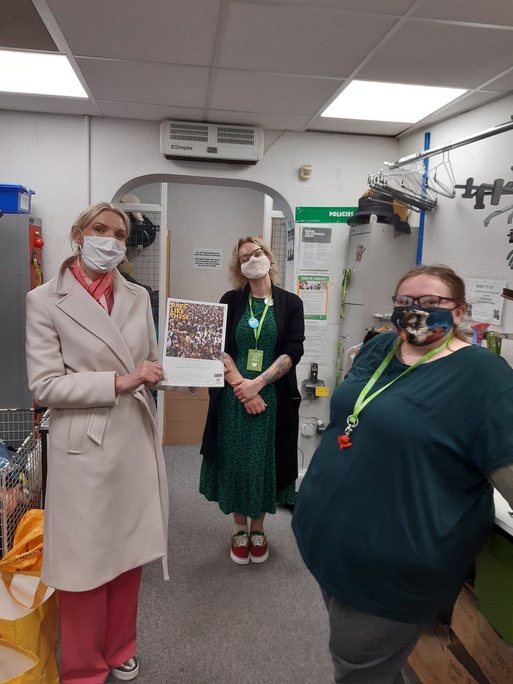 Staff wearing masks in the Oxfam Newport shop