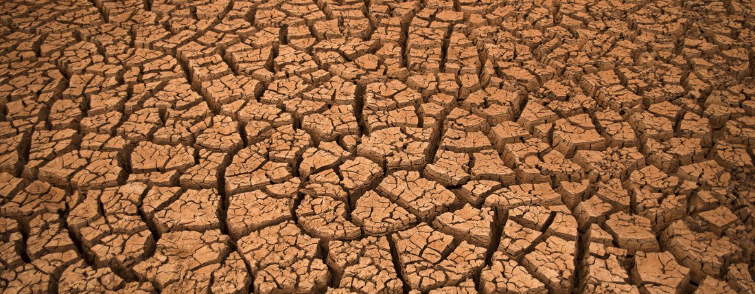 Drought-cracked earth in Kenya