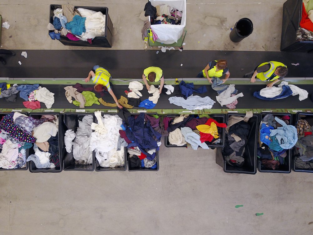 Volunteers sorting clothing at Bately
