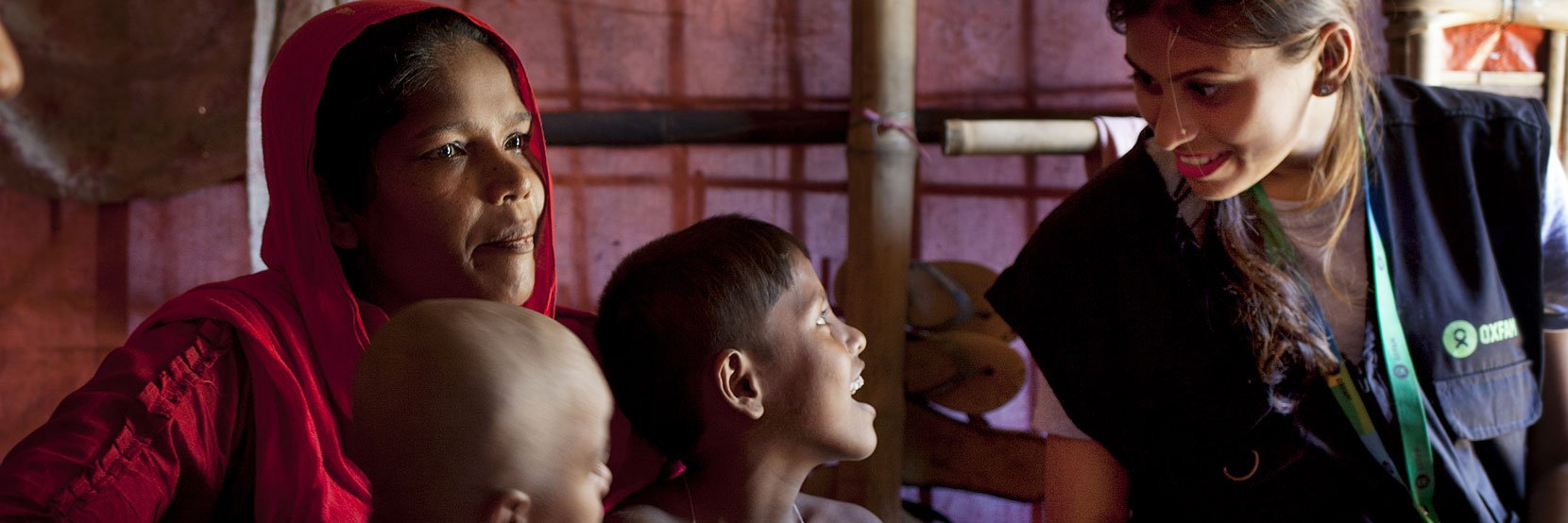Iffat, humanitarian public health promoter for Oxfam, talks to Rohingya refugee in Cox's Bazar, Bangladesh.