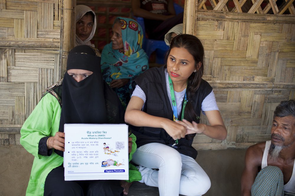 Iffat is a humanitarian public health promoter for Oxfam. In this photo she is training Rohingya refugees about good health and hygiene in Cox’s Bazar, Bangladesh.