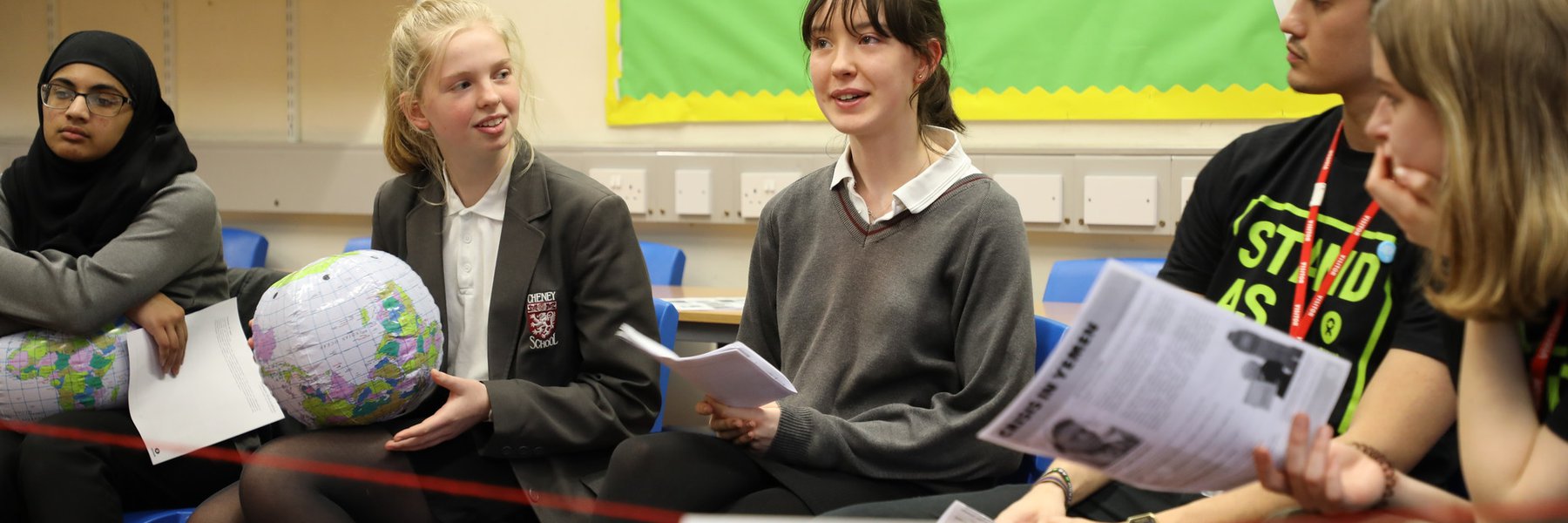 Pubils in uniforms in a classroom workshop