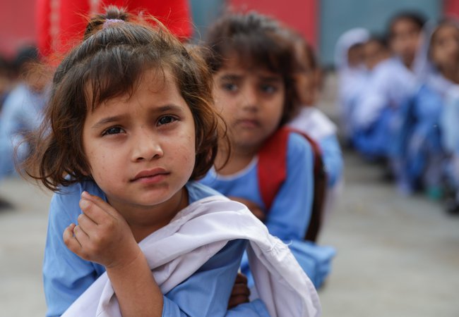 A student at the morning assembly at her school in Multan, Pakistan.