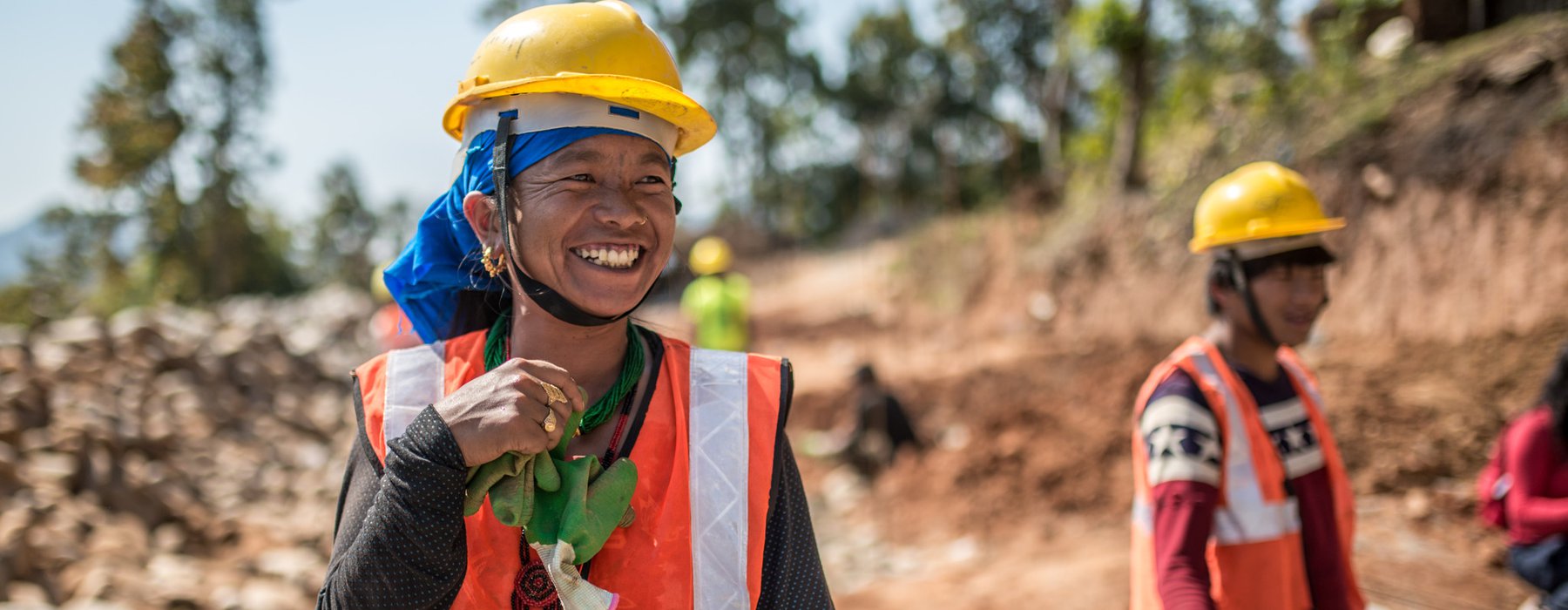 Female construction worker Kaile (20yrs) stands in a housing site in Kharanitaar village, Nepal