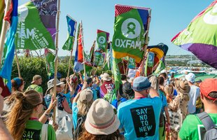 Oxfam taking part in Extinction Rebellion march during Glastonbury