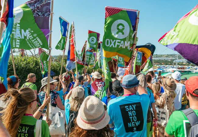 Oxfam taking part in Extinction Rebellion march during Glastonbury
