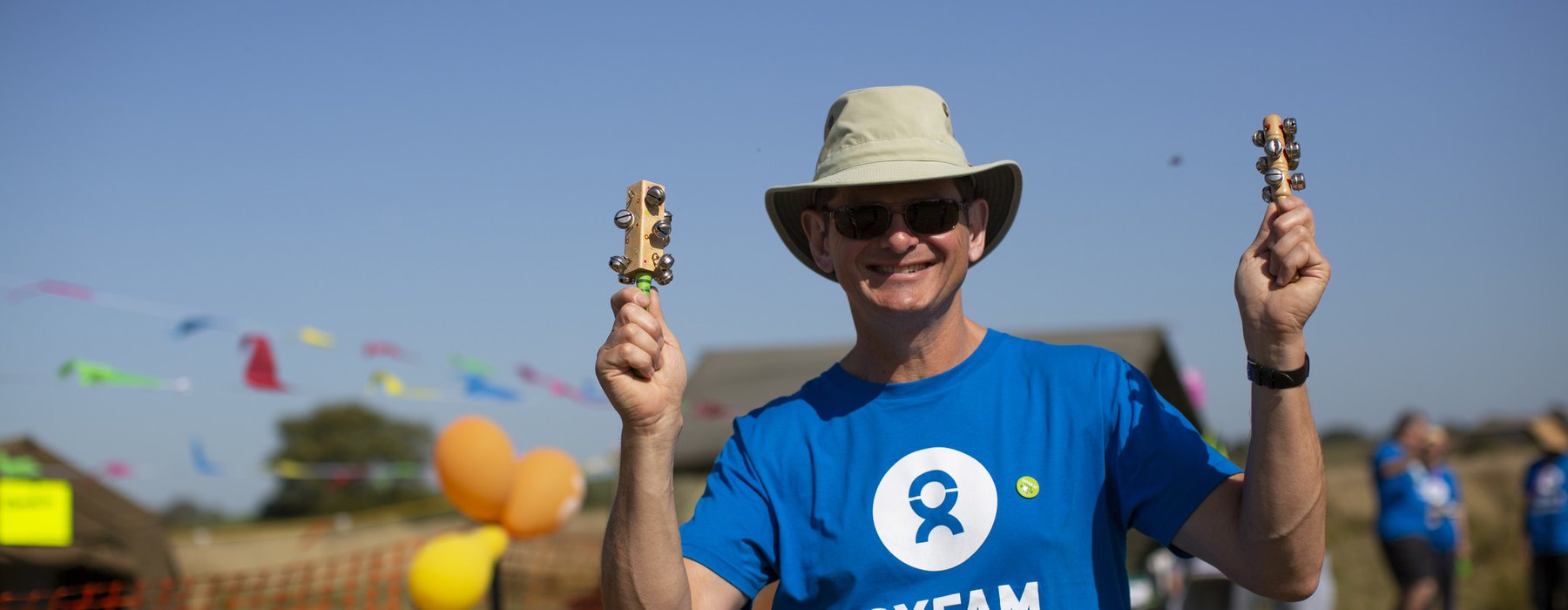 An Oxfam volunteer at Trailwalker 2019