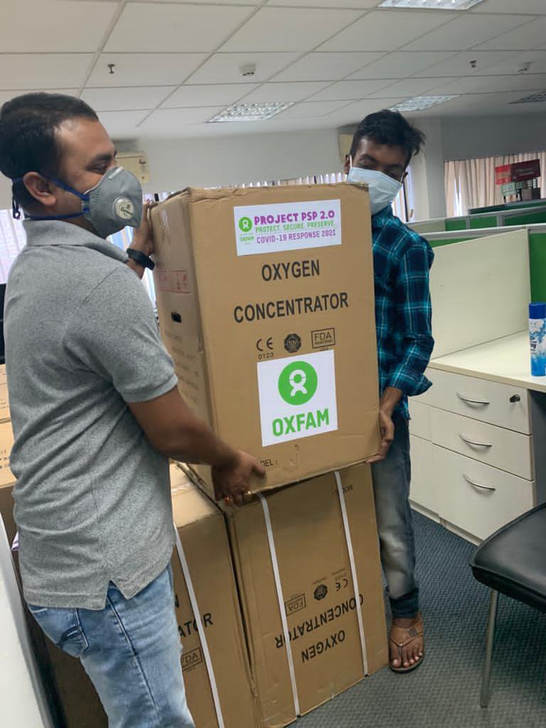 Oxygen supplies in boxes with Oxfam labels on them