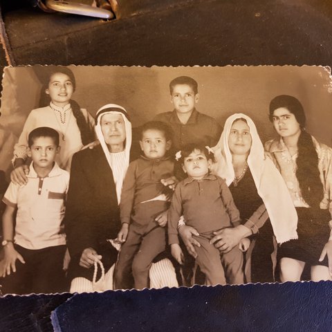 A sepia photograph of Dr. Khalid's family