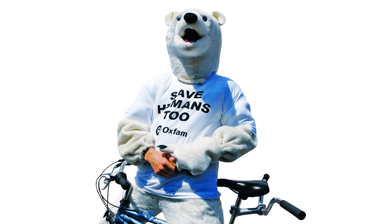 A climate protestor dressed as a polar bear