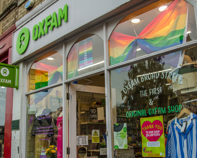 Oxfam Broad Street Shop with Pride decorations in the window
