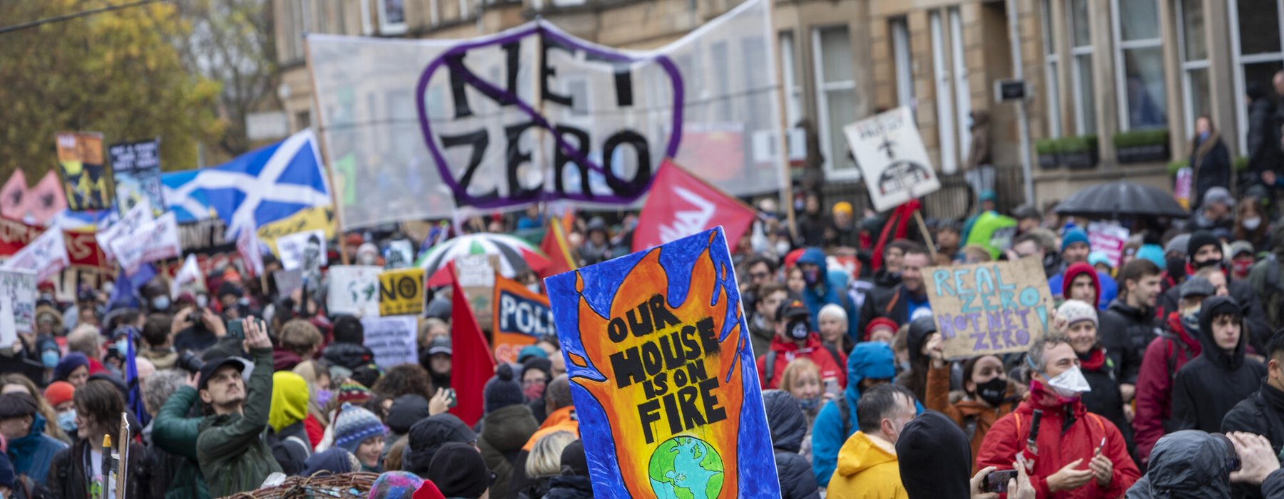 Campaigners marching in Glasgow as part of the Global Day of Climate Action in November 2021