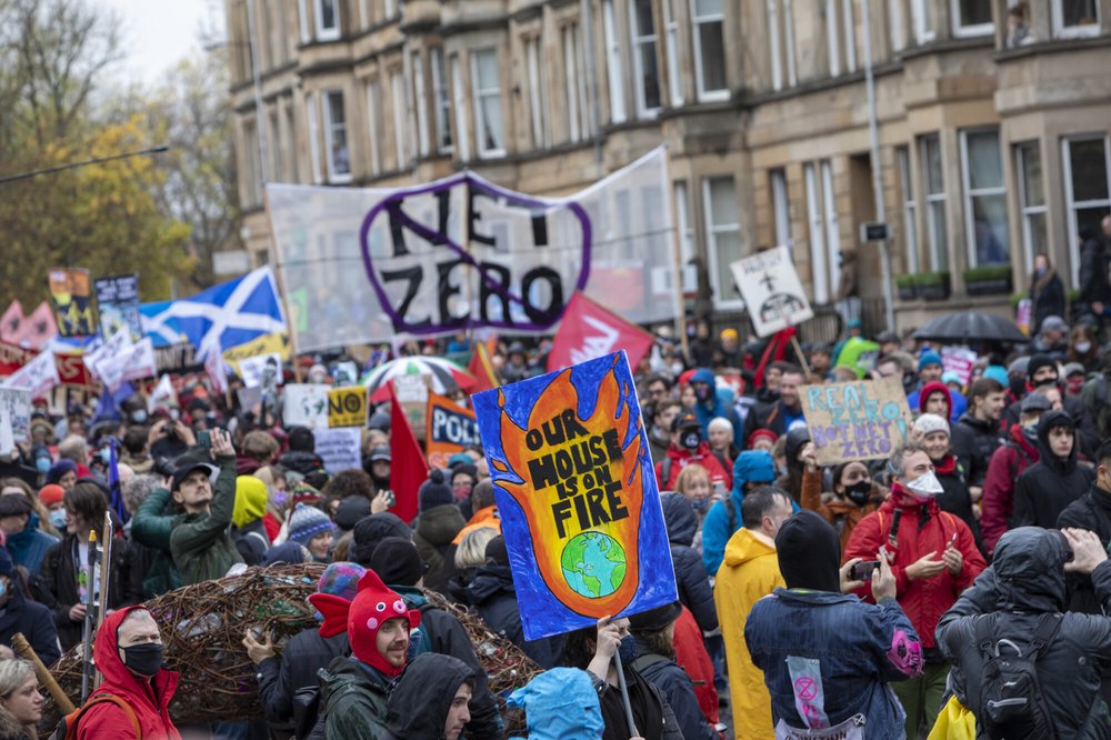 Campaigners marching in Glasgow as part of the Global Day of Climate Action in November 2021