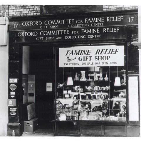 A black and white photo of an Oxfam shop in the 40s in Oxford