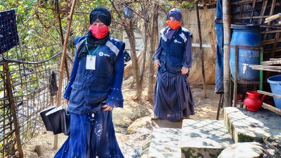 Oxfam volunteers Rejuana (left) and Monira, who work in the refugee camps at Cox's Bazar, Bangladesh.