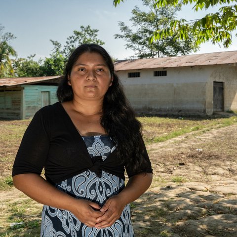 Heydi Ramirez stands in front of convergence centre where the Sebol, Guatemala community’s children used to get vaccinated stands.