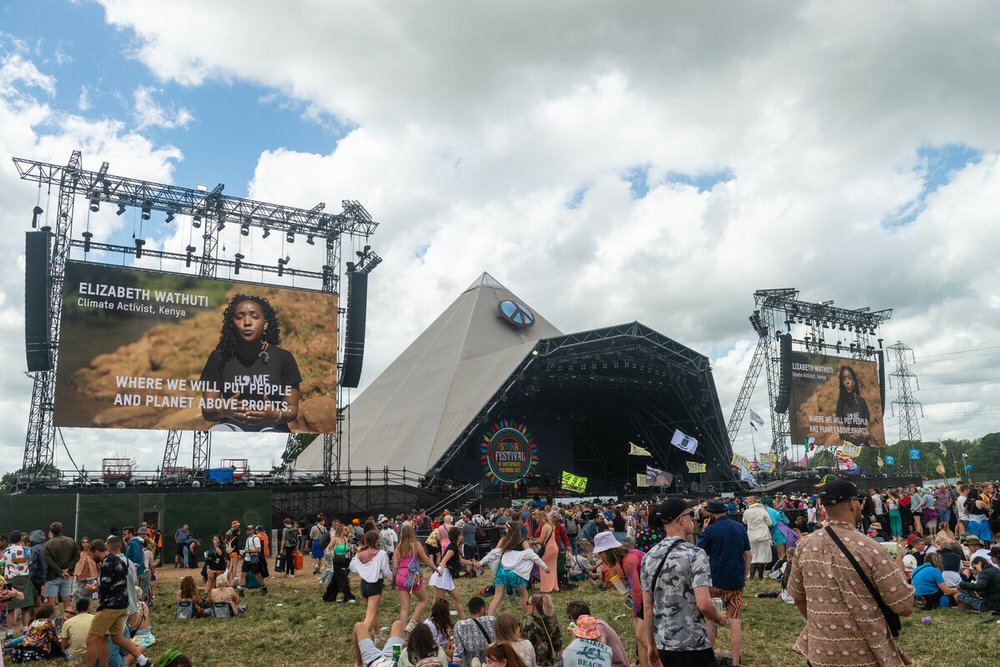 Oxfam's film, featuring climate activist and Oxfam ambassador, Elizabeth Wathuti, plays on the big screens at the 2022 Glastonbury Festival.