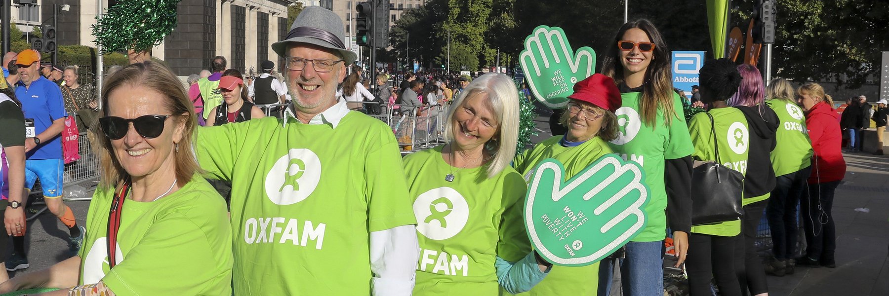 Oxfam volunteers cheering at the London Marathon