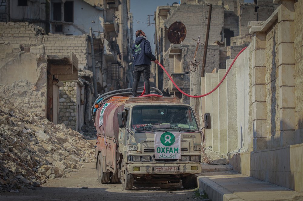 An Oxfam lorry delivering water to shelters in Aleppo city, Syria.
