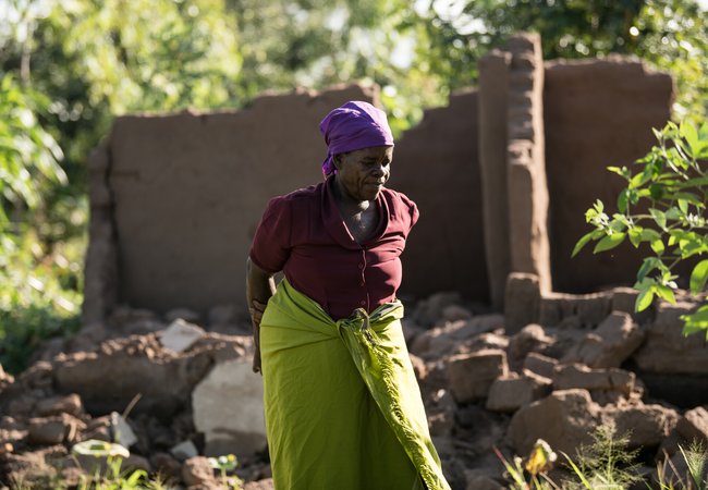 65-year-old Ligineti Nayinayi is outside her house damaged by Cyclone Freddy in Phalombe southern Malawi