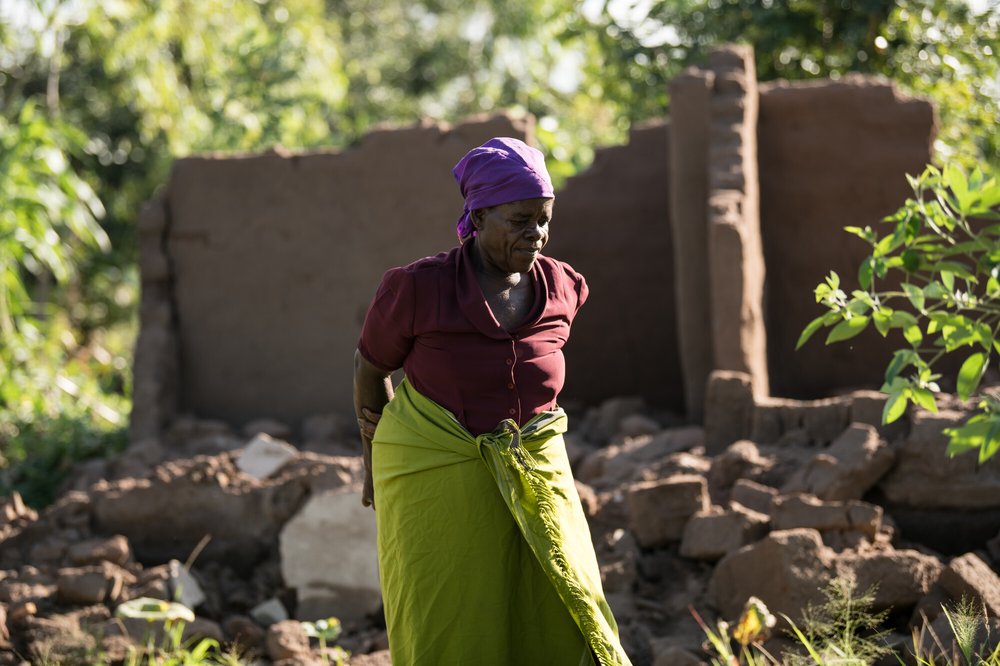 65-year-old Ligineti Nayinayi is outside her house damaged by Cyclone Freddy in Phalombe southern Malawi