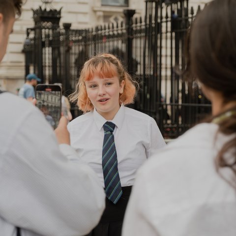 Send My Friend to School student Mia outside Downing Street prior to petition hand in.