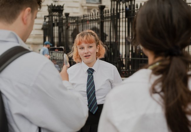 Send My Friend to School student Mia outside Downing Street prior to petition hand in.