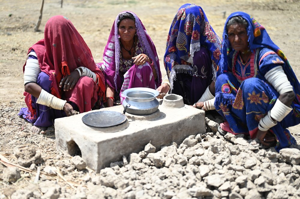 Luni with other women from her village using the environment-friendly stoves.