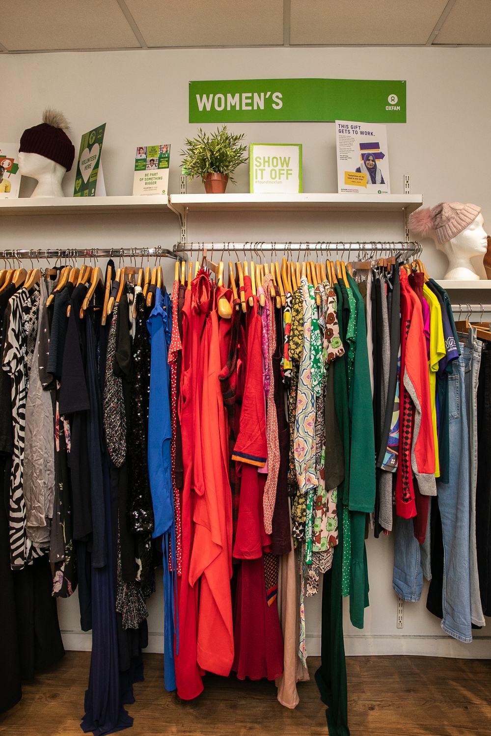 A rail of brightly coloured clothing