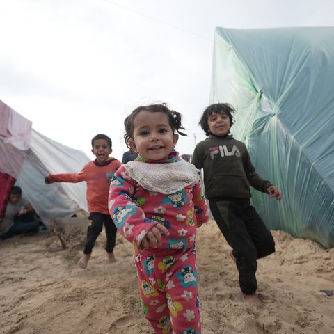 Children playing amongst the tents in Rafah, Gaza.