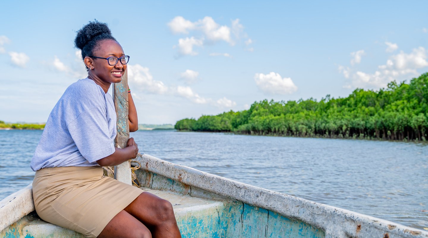 Joyce Koech sits in a boat, Mombasa County, Kenya