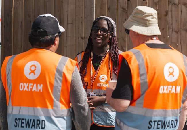 Ajay Ramtohul, Liv Anthony-Uzoeto and Jason Ratcliffe stewarding in the Metropolis area at Boomtown Festival 2024