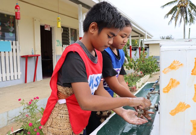 Nine year old Christopher and Nanise are members of the WASH club at Pangai Primary School on remote Ha'apai island in Tonga.
