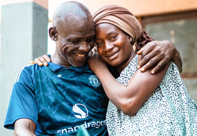 Grace Ibrahim and Ibrahim Musa hug in Adamawa State, Nigeria