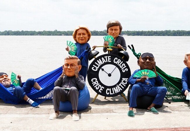 SLEEPING ON THE JOB: Ahead of #COP30, Oxfam staged a Big Heads protest in Belem, Brazil to call out rich nations for their climate inaction.