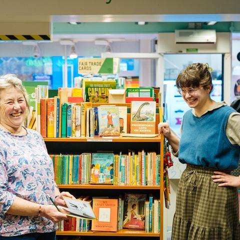 Volunteers Susan and Anna having a friendly chat at Oxfam Shop Bedford Street, Norwich.