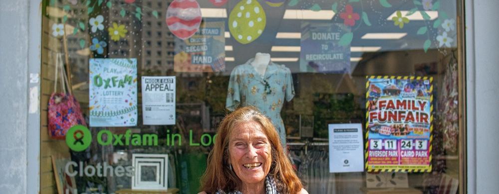 Barbara stands outside the Lochee shop