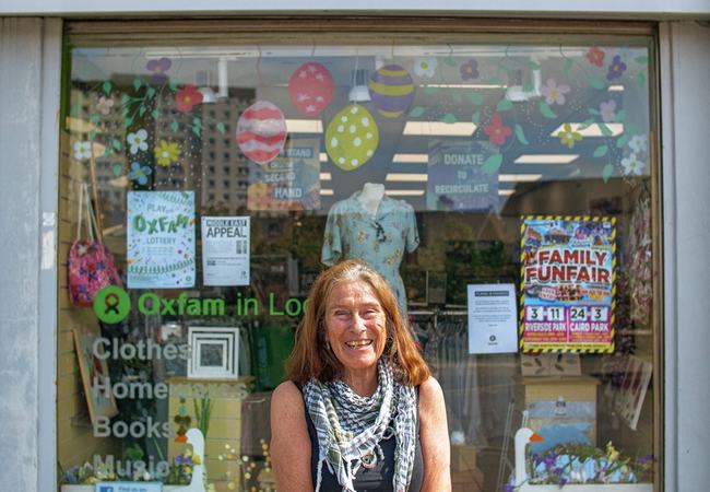 Barbara stands outside the Lochee shop